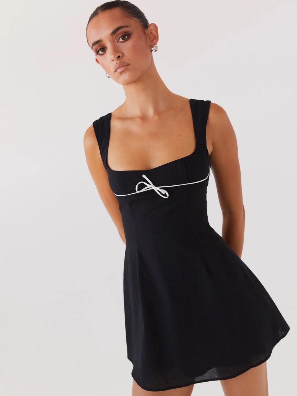 Peppermayo Cadence Black Mini Dress with White Piping Bow